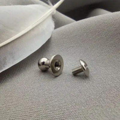 Screw for a leather bracelet